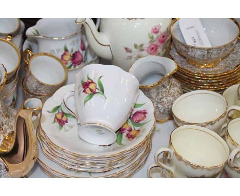 TWO COFFEE SETS AND A FLORAL SET SET
one coffee set floral, the other with gilt scrolling, both with pots, the floral tea set