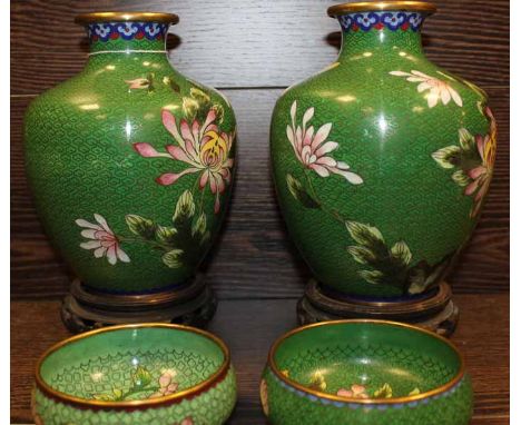 PAIR OF CLOISONNE ENAMEL VASES WITH HARDWOOD STANDS
21cm high overall; and a pair of cloisonne enamel circular bowls (4)