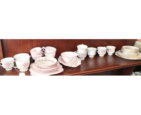 TUSCAN FINE ENGLISH BONE CHINA TEA SERVICE
decorated with floral sprays on a pink ground, with gilt highlights; together with