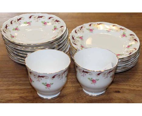 CROWN STAFFORDSHIRE WENTWORTH PART TEA SET
together with another late Victorian unmarked part tea set with floral and gilt de