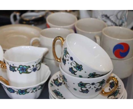 THREE PART TEA SETS
including a japanese eggshell with dragon reliefs, a cream set od coffee cans with a spiralling design, a