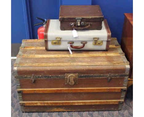 LARGE CANVAS STEAM TRUNK
with wooden slats, 91cm long; together with a canvas suitcase and a smaller leather case (3)