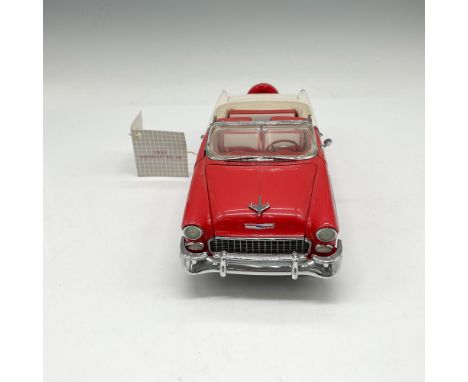 Metal replica colored in red and white. Moveable parts include doors, hood and trunk. Franklin Mint tag. B11TQ17. This item h