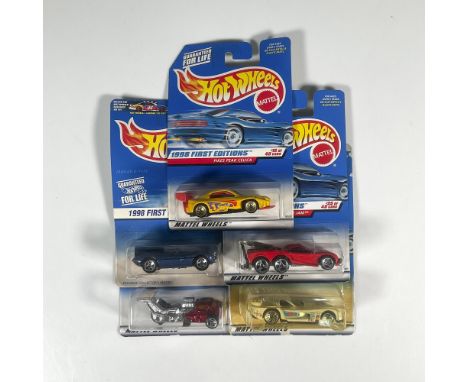 A set of 5 hot wheels toy car that consist of the Pike Peak Celica (15 of 40), the Panoz GTR-1 (19 of 40), the Tow Jam (25 of