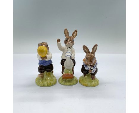 Glossy porcelain bunnies set, playful theme. Includes: Tom Bunnykins DB72 playing with a slingshot, dressed with a white shir