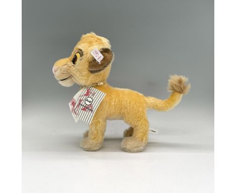 Disney's Simba in golden mohair standing. Steiff tag attached. Includes Certificate of Authenticity. Dimensions: 11"L x 3.75"