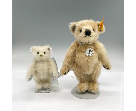 2007 off-white bear ornament holding a porcelain Lladro bell, 3.25"L x 1.75"W x 4.75"H; includes original box, 6"L x 4"W x 2"