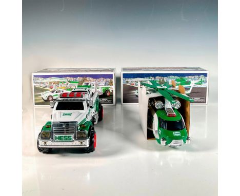 2011 Toy Truck and Race Car and 2012 Helicopter and Rescue. Battery operated collectibles with sounds, lights, and flashers. 