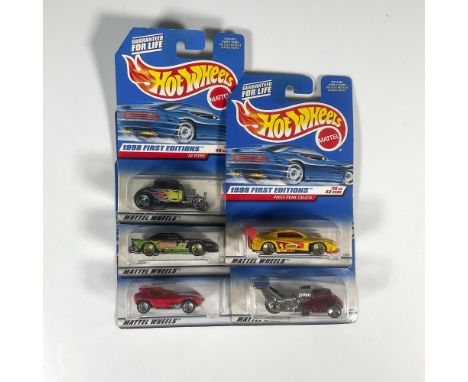 A set of 5 Hot Wheels cars that consists of the Mustang Cobra (18 of 40), the Cat-A-Pult (38 of 40), the Whatta Drag (36 of 4