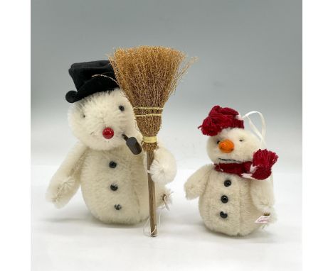 Both have moveable arms and head. Roly Poly Snowman with black hat, pipe in mouth, holding a broom, 5"L x 4"W x 6.75"H. Roly 