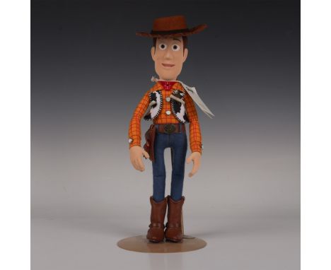 Woody, the main character from the animated film Toy Story is handmade in the finest wool felt with jointed arms and head. Ma