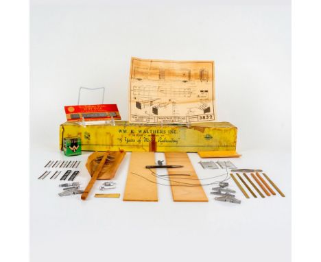 Box is labeled "Penn. Merchandise No. 3832." Many parts including, box of wire brads, instructions, 6-inch tempered steel sti