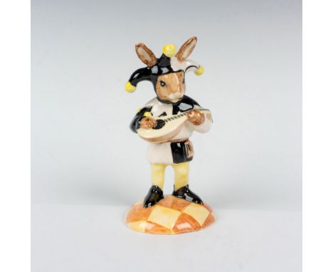 Unusual colorway variation; black and white attire with yellow pompoms. Figure of Bunnykins jester playing the mandolin. Roya