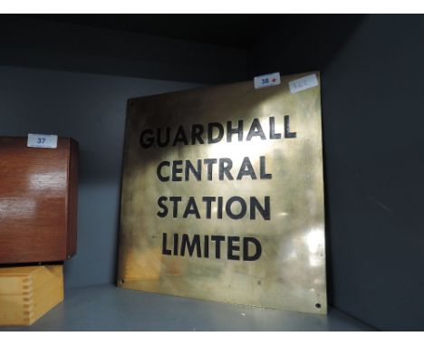 A heavy set brass and enamel sign for Guardhall Central Station engineering