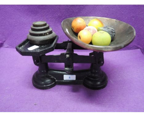 A set of vintage cast kitchen scales