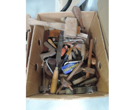A selection of woodworking tools chisels and markers etc