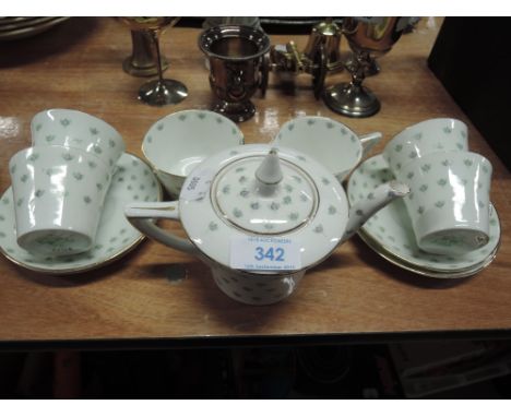 A vintage miniature tea and coffee set, 4 settings, stamped H M Wildman &amp; Sons (early Shelley) Blossom pattern