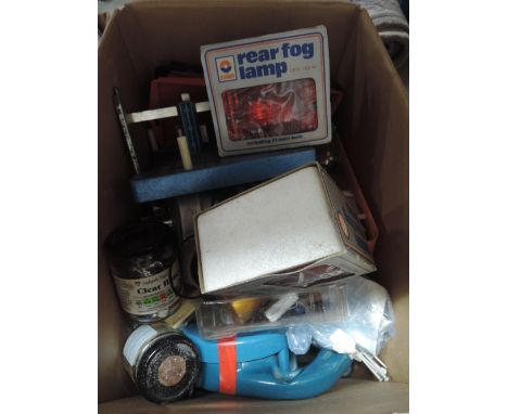 A box of tools and car parts etc