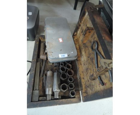 A selection of tools including socket set