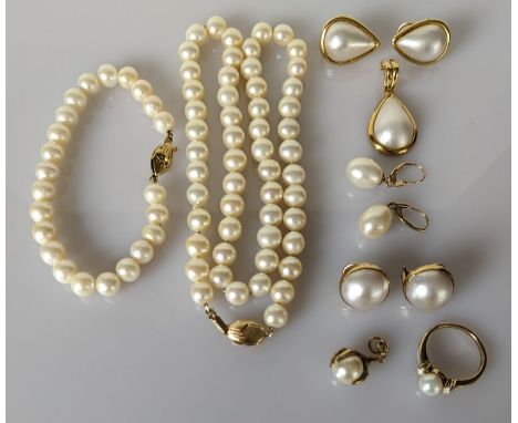 A cultured pearl necklace with 14ct gold clasp, 46 cm; a similar bracelet with yellow metal clasp, unmarked, 18cm, all pearls