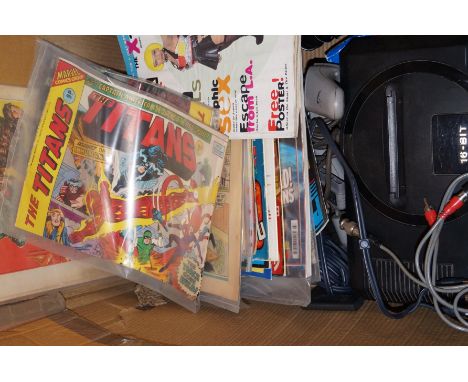 Various console gaming equipmenet and games, together with a collection of comic books 