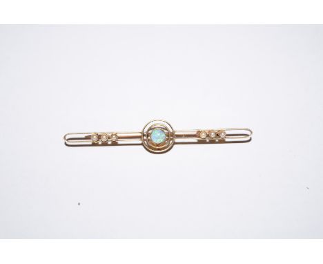 15 ct gold pin broach with central opal and 6 pearls 