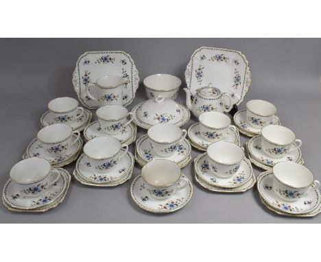 A Shelley Tea Set to comprise Twelve Cups, Milk Jug, Bachelors Tea Pot, Slop Bowl, muffin Dish, Two Cake Plates, Twelve Side 