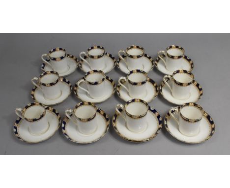 A Port China Coffee Set to comprise Twelve Coffee Cans and Twelve Saucers 