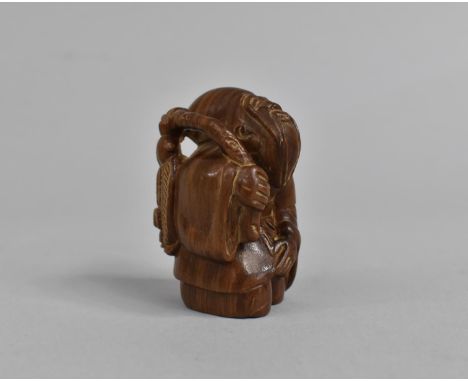A Carved Wooden Netsuke, Robed Elder, 5.5cm high 