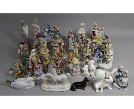 A Collection of Various Continental Figural Glazed and Bisque Ornaments (Condition Issues) 