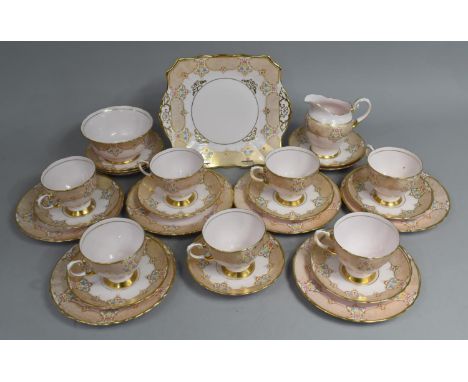 A Tuscan Pink and Gilt Decorated Tea Set with Polychromed Flower Floral Design to Comprise Severn Cups, Twelve Saucers, Six S