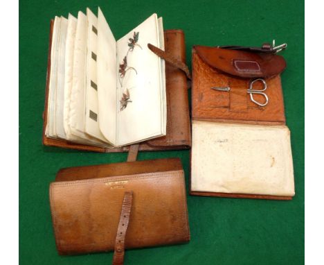 WALLETS: (3) Collection of 3 early pigskin/leather fly/cast wallets, one by Hardy, containing assorted casts, tools and small