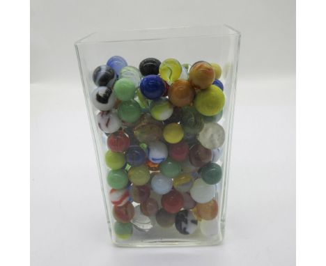 Collection of beautiful vintage colorful glass toy marbles in clear glass rectangular vase. Issued: 20th centuryDimensions: G