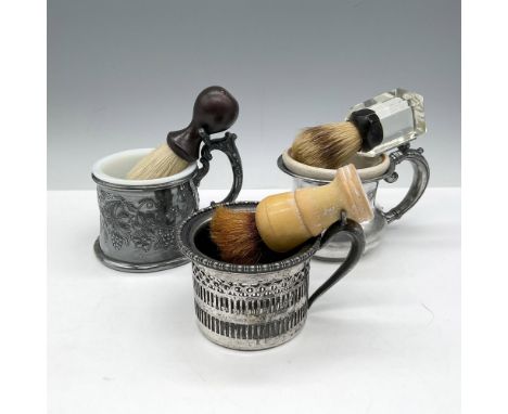 Grooming mugs, silverplated with porcelain, ceramic and metal insert cups with shaving brushes. Meriden impressed mark. Large