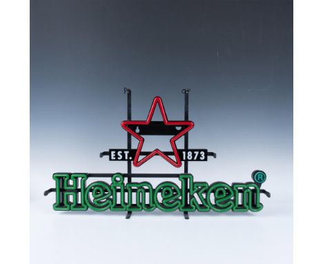 Straight from the 1990s, this original neon bar sign produced by Dekkers International measures 15.25"L x 26.5"W x 2.75"H and
