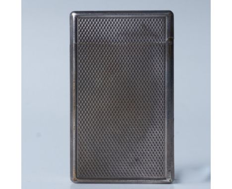 This silver metal lighter has an engraved serial number and S.T. Dupont hallmarks. Dimensions: 1.25"L x 0.5"W x 2.25"HManufac