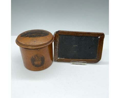 This log-cut wood box, crafted from wood grown on the field where the Battle of Bannockburn was fought, features a depiction 