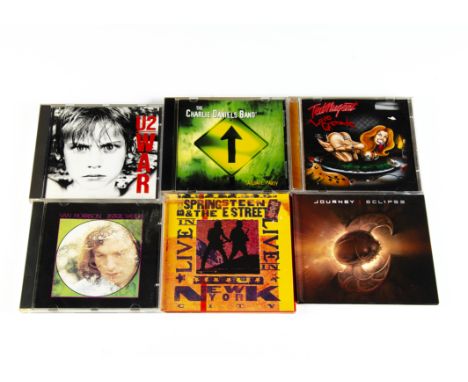 CDs, approximately one hundred and fifty albums of various genres with artists including Bon Jovi, System of a Down, Blue Oys