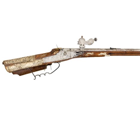 A .54 BORE GERMAN WHEEL-LOCK SPORTING RIFLE, CIRCA 1660 AND LATER with octagonal swamped sighted barrel rifled with six groov