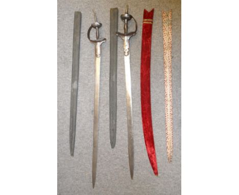 TWO INDIAN SWORDS (FIRANGI), LATE 17TH/18TH CENTURY each with long double-edged blade, characteristic hilt with broad knuckle