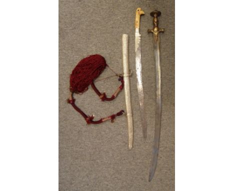 AN INDIAN SWORD (TALWAR) AND ANOTHER SWORD, 19TH/20TH CENTURY the first with curved fullered blade double-edged towards the p