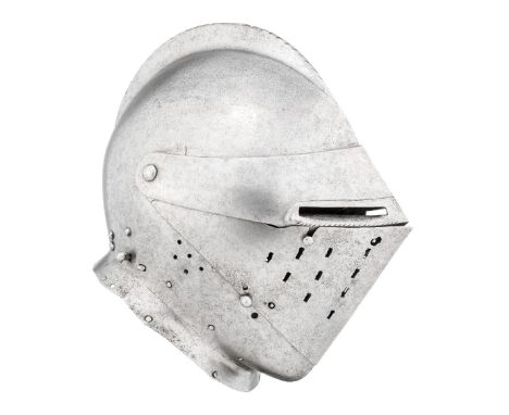A COMPOSITE SOUTH GERMAN CLOSE HELMET FOR HEAVY FIELD USE, CIRCA 1540-50 with rounded one-piece skull rising to a low file-ro