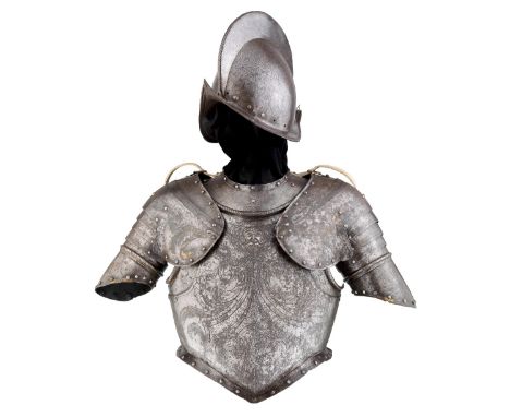 A RARE NORTH ITALIAN HALF ARMOUR, LATE 16TH / LATE 17TH CENTURY, FOR USE BY THE SWISS PAPAL GUARD comprising associated morio