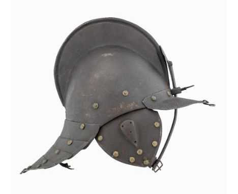 A GERMAN ZISCHÄGGE, FIRST HALF OF THE 17TH CENTURY with rounded two-piece skull joined by a turn along the crest of a high me