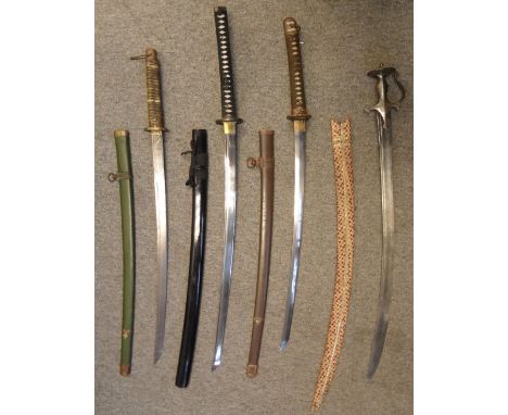 A JAPANESE W.W.II KATANA AND AN INDIAN TALWAR the first with factory blade of regulation type, signed tang, regulation mounts