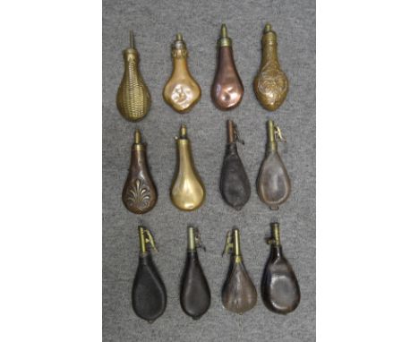 A GROUP OF ELEVEN POWDER AND SHOT-FLASKS FOR SPORTING GUNS, 19TH CENTURY AND LATER comprising a plain copper flask by Sykes; 