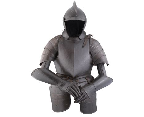 A COMPOSITE SOUTH GERMAN LIGHT FIELD ARMOUR, AUGSBURG, CIRCA 1600-20 comprising burgonet with rounded one-piece skull rising 