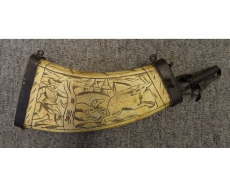 A GERMAN ENGRAVED COWHORN POWDER-FLASK, EARLY 17TH CENTURY with curved flattened body numbered '199', the inner face engraved