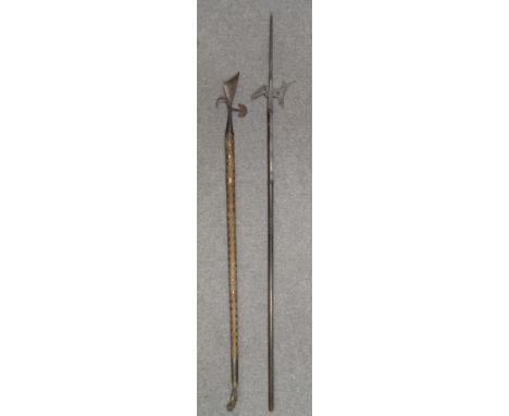 ‡ A HALBERD IN STYRIAN LATE 16TH CENTURY STYLE AND AN UNUSUAL VENETIAN STAVE, 19TH CENTURY the first with curved pierced axe-
