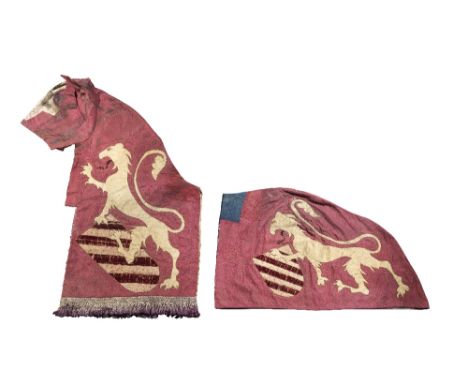 A HORSE CAPARISON, 19TH CENTURY of two parts entirely covering the horse's body including the head, each of crimson damask si